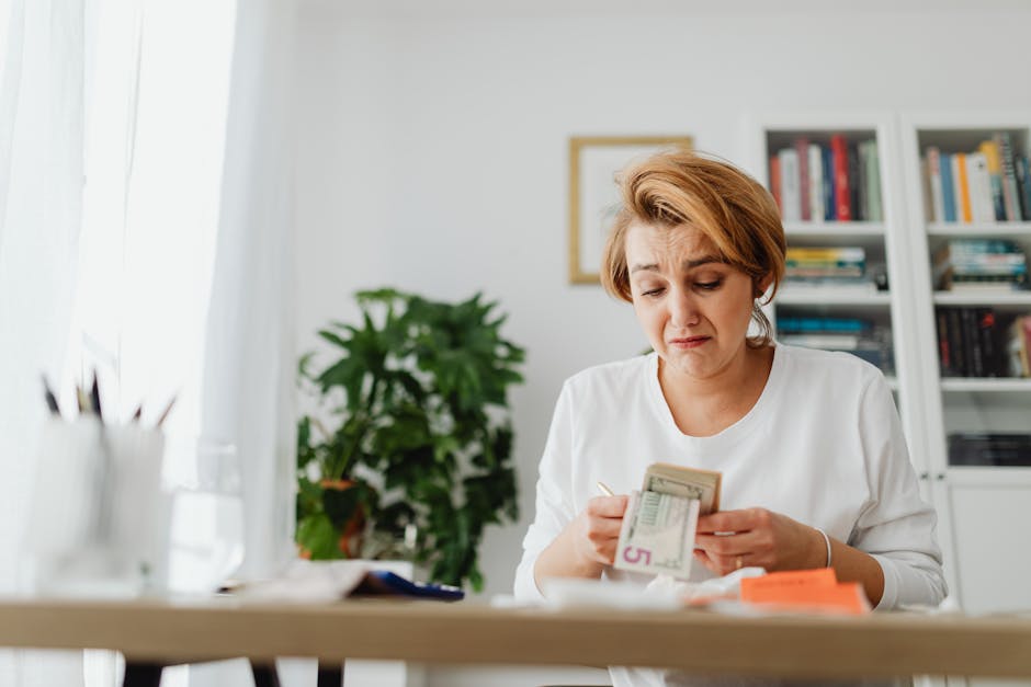 Financial consultant analyzing investment portfolio with client